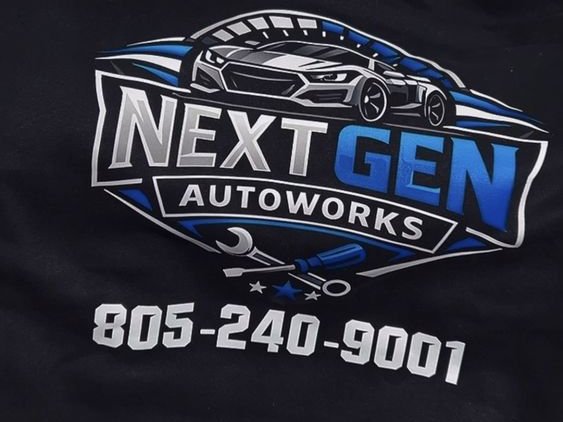 The back of a black hoodie printed with a silver and blue auto shop logo and a phone number in white.